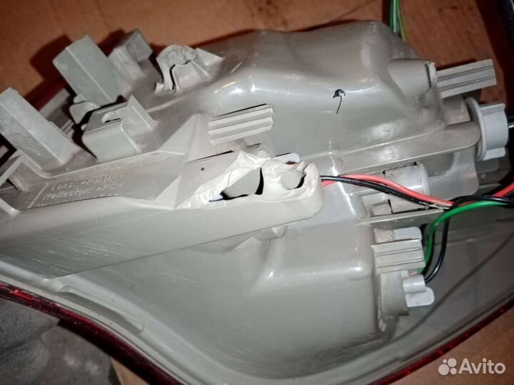 Фонарь задний внешний левый Nissan Almera G15