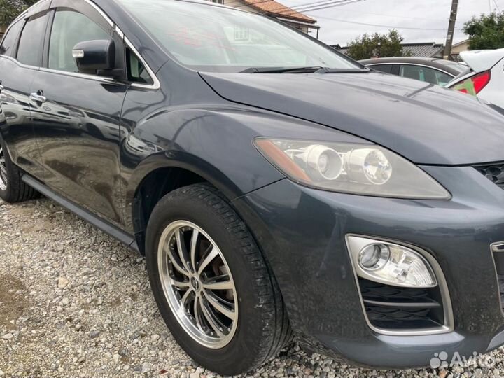 В разборе Mazda CX-7 (ER) 2011г. рестайлинг