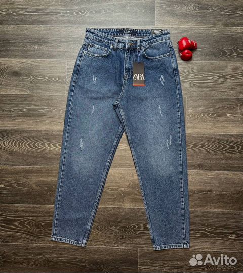 Джинсы с потертостями