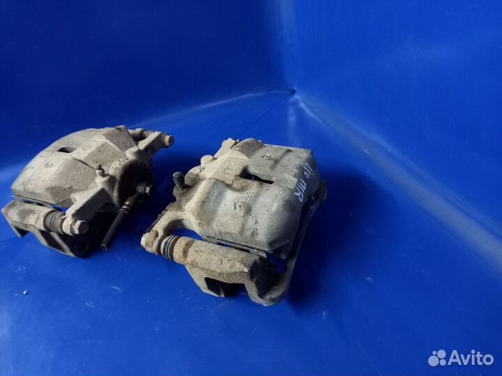 Суппорт тормозной передний Nissan Qashqai I рестай