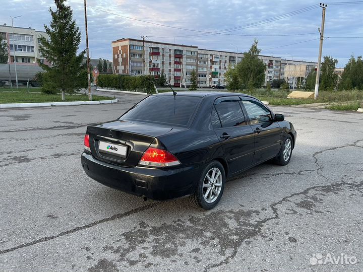 Mitsubishi Lancer 1.6 AT, 2009, 246 000 км