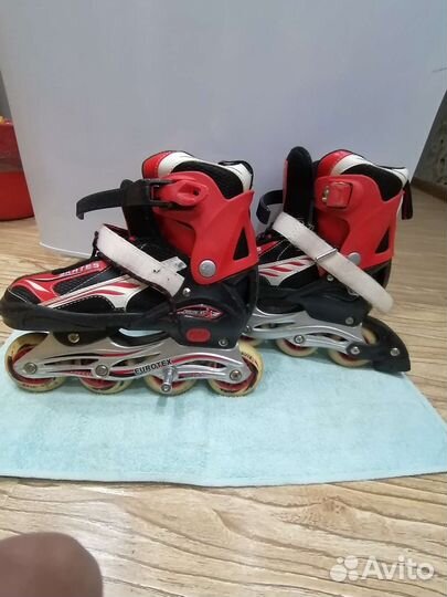 Роликовые коньки