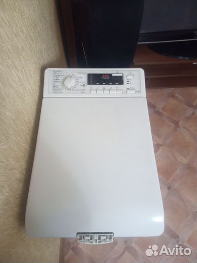 Стиральная машина с вертикальной загрузкой