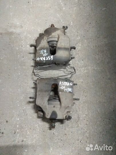 Тормозной суппорт Opel Astra G
