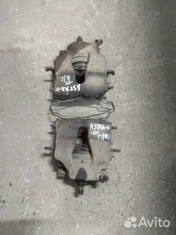 Тормозной суппорт Opel Astra G