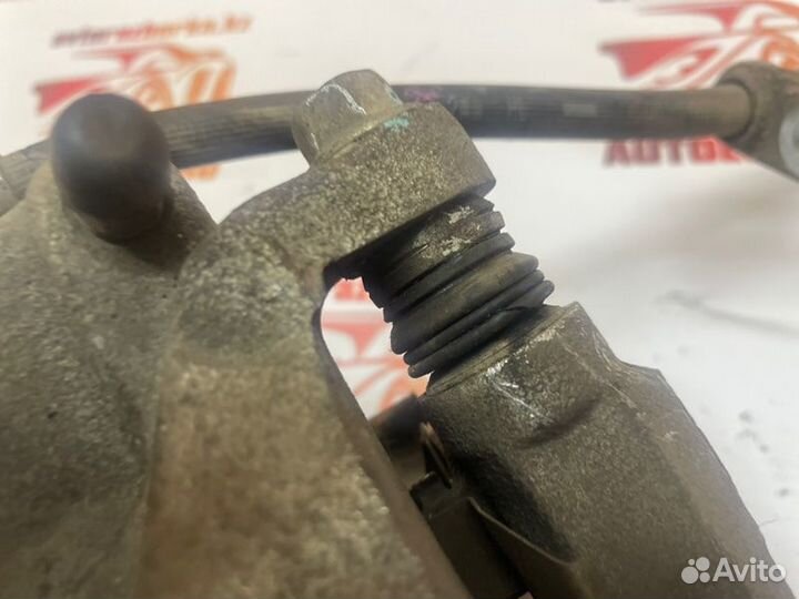 Суппорт тормозной передний левый Honda Cr-V 4 RE5