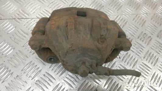 Суппорт тормозной передний правый KIA sportage 2