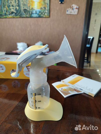 Молокоотсос medela ручной