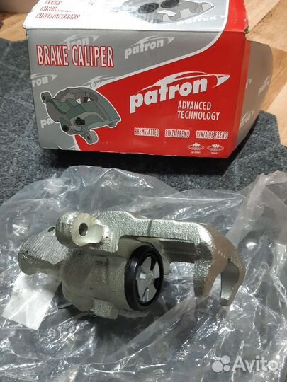 Суппорт тормозной задний правый для Nissan Primera