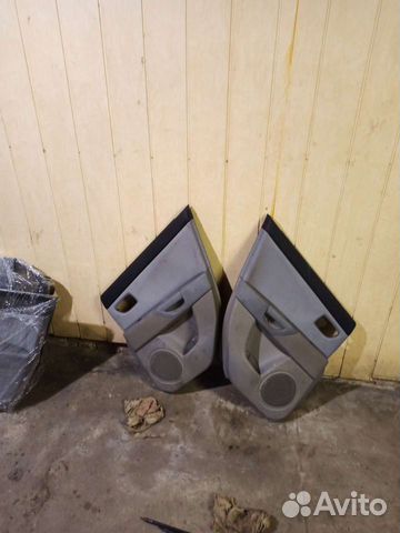 Обшивки дверей мазда 3 бк