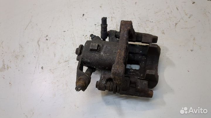 Суппорт левый задний Skoda Octavia Tour