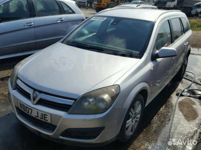 Привод передний левый Opel Astra L35