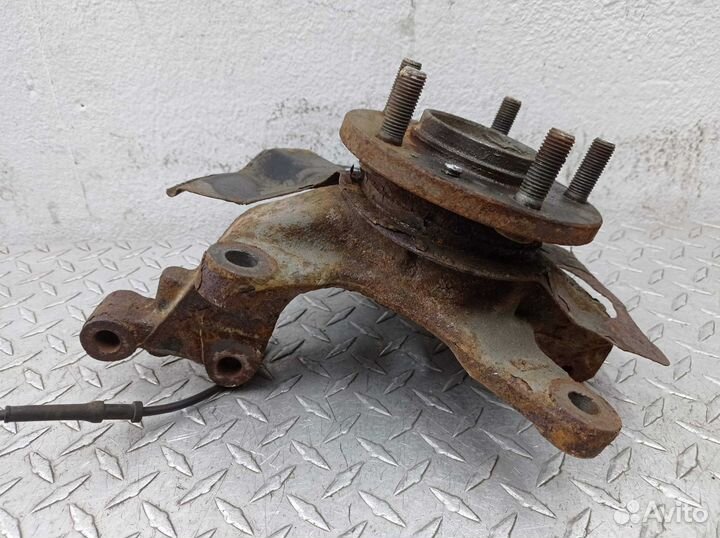 Кулак поворотный левый Mazda CX-9 1 TB