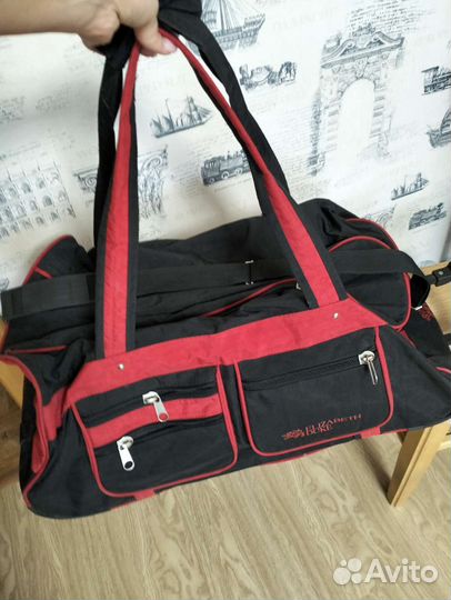 Сумка дорожная на колесах с выдвижной ручкой