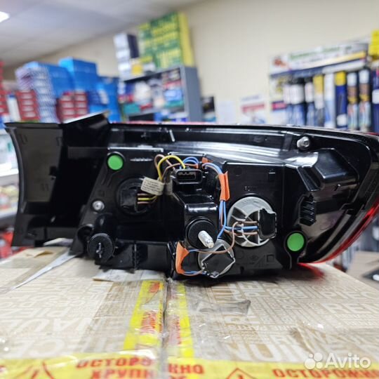 Фонарь задний левый Рено Аркана