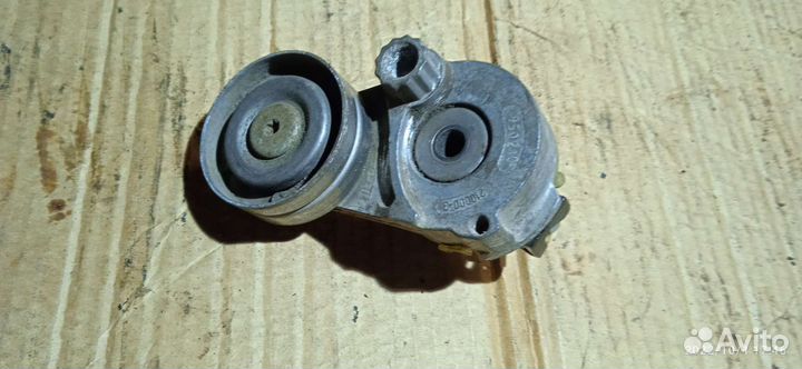 Натяжитель ремня генератора Astra h