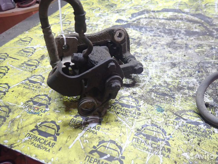 Суппорт тормозной задний левый Kia RIO 2011-2017