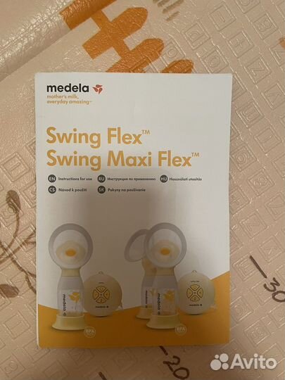 Молокоотсос medela swing