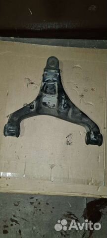 Рычаг передний левый