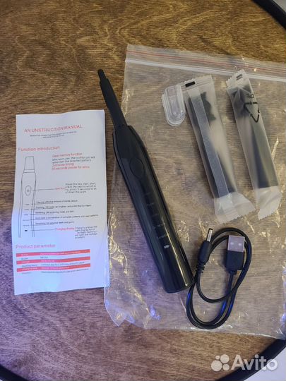 Электрическая зубная щетка