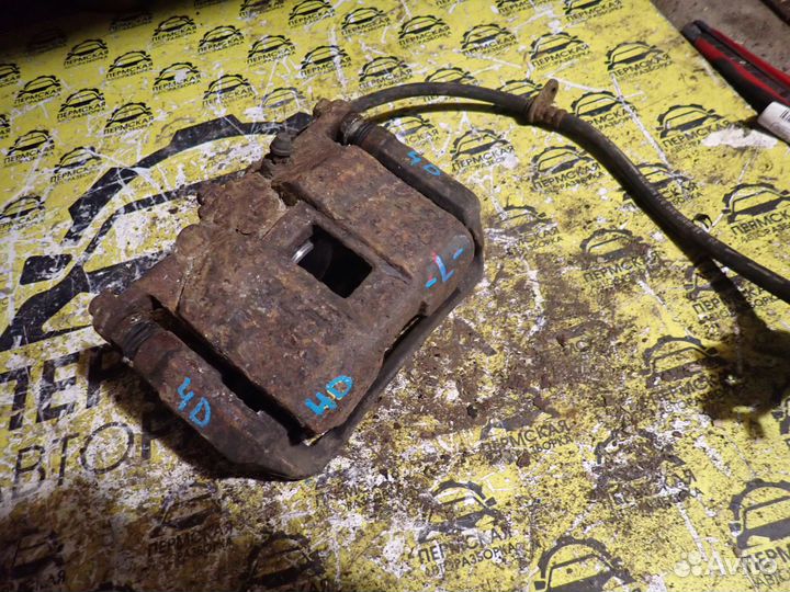 Суппорт тормозной передний левый Honda Civic 4D