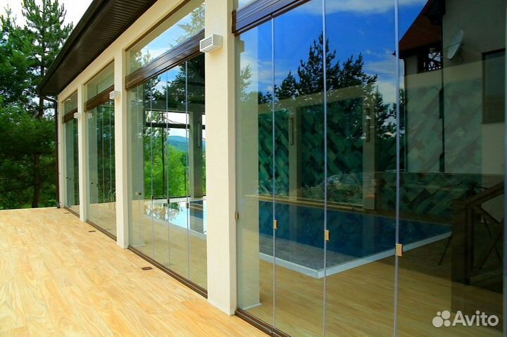 Безрамное раздвижное остекление