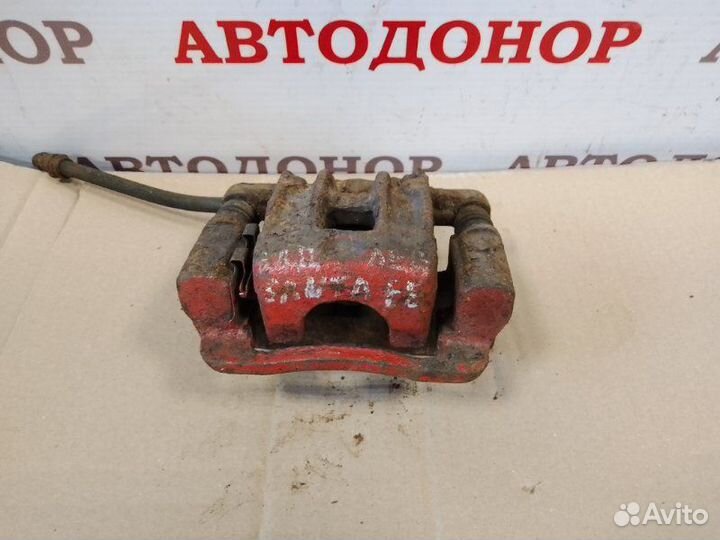 Суппорт тормозной задний левый Hyundai Santa Fe