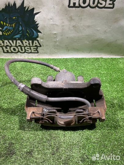 Суппорт передний левый Volkswagen Passat B6 CDA