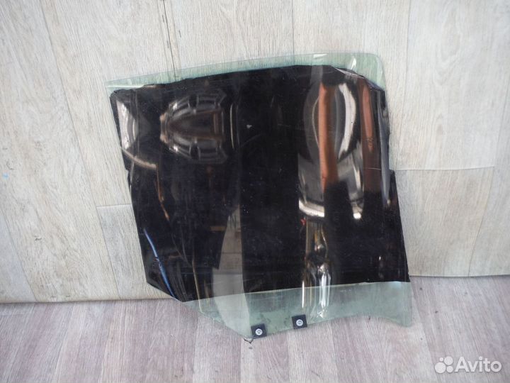 Стекло двери задней левой Renault Symbol 2005
