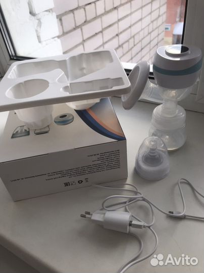 Молокоотсос электрический новый