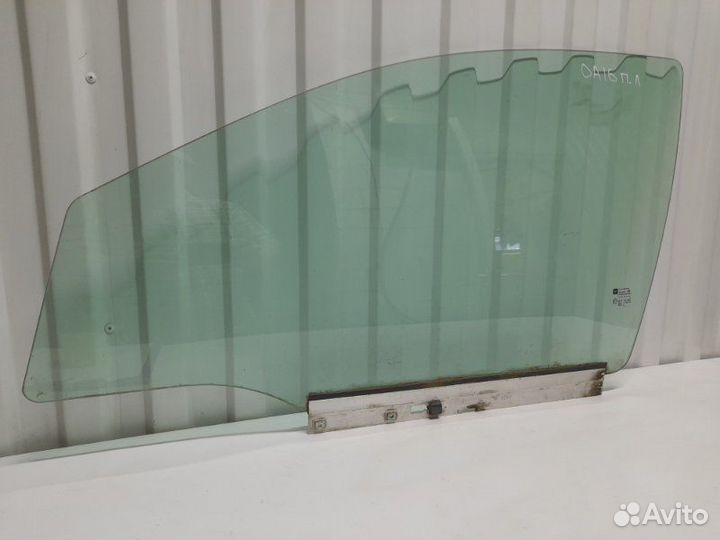 Стекло двери передней левой Opel Astra H