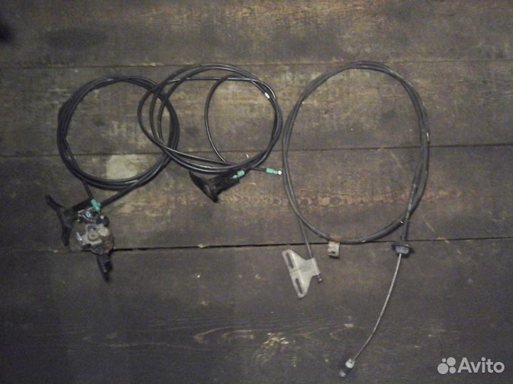 Трос капота бака Mitsubishi Carisma