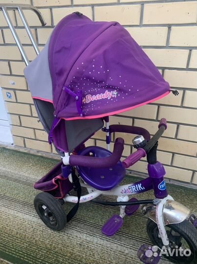 Трехколесный велосипед с ручкой