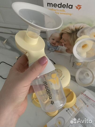 Молокоотсос medela swing maxi flex