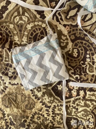 Бортики в кроватку в виде подушечек