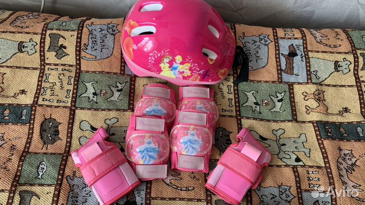 Роликовые коньки