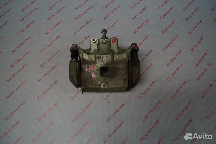 Nissan 41011-ET00A Суппорт тормозной правый