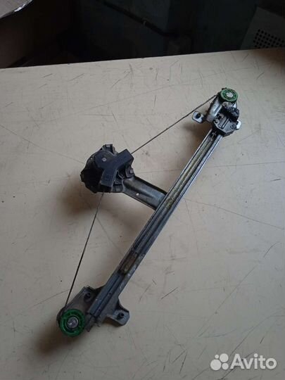 Стеклоподъёмник задний левый Opel Vectra A Опель