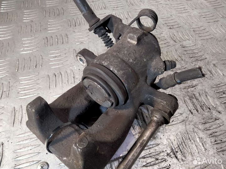 Суппорт задний левый Opel Astra H