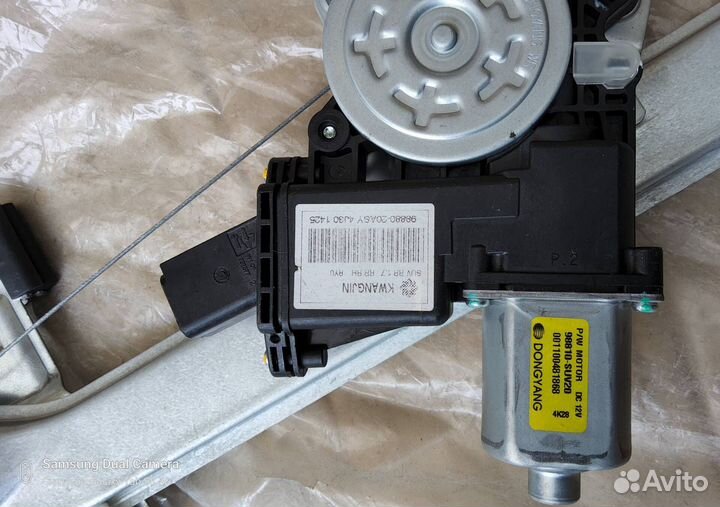 Моторчик заднего правого стеклоподъемника Opel Mok