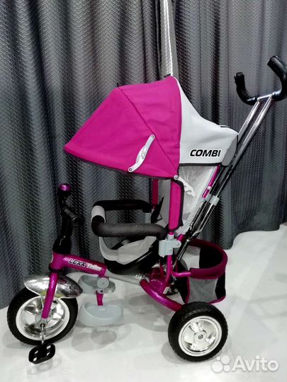 Трехколесный велосипед с ручкой