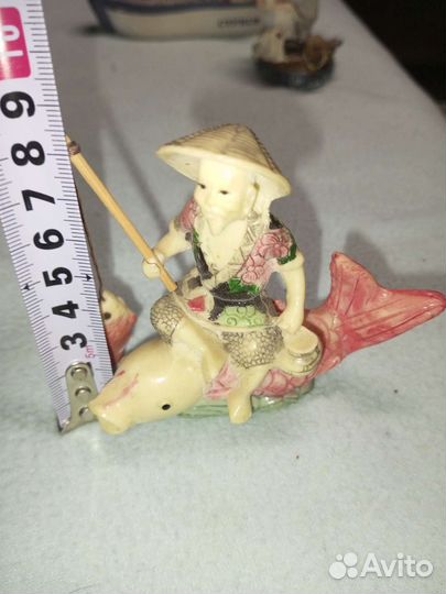 Коллекция фигурок рыбаков