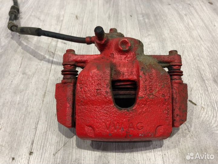 Суппорт тормозной передний правый Volkswagen Polo