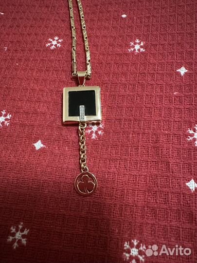 Золотая подвеска с ониксом