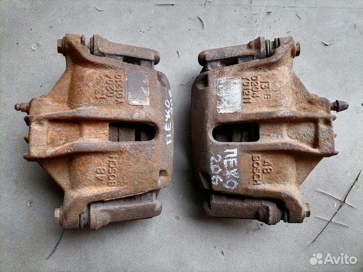 Суппорт тормозной передний Peugeot 206 1998-2012