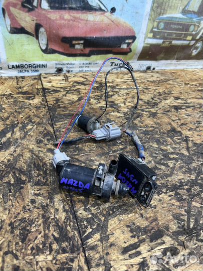 Насос омывателя фар Мазда CX7