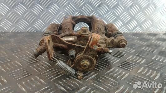 Суппорт тормозной задний левый chevrolet trax (UML06LS01)