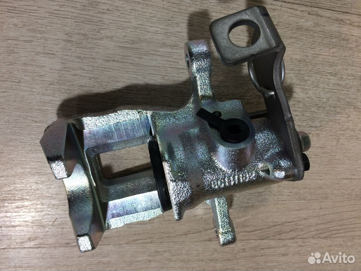 Суппорт задний правый Киа Рио 3 Солярис 1 mando