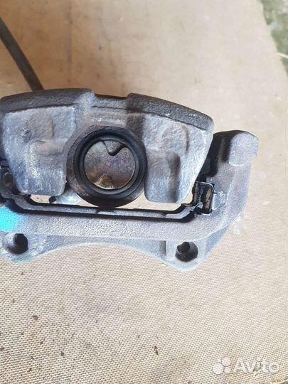 Суппорт тормозной задний правый Мазда 6GH