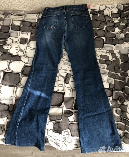 Джинсы клеш женские